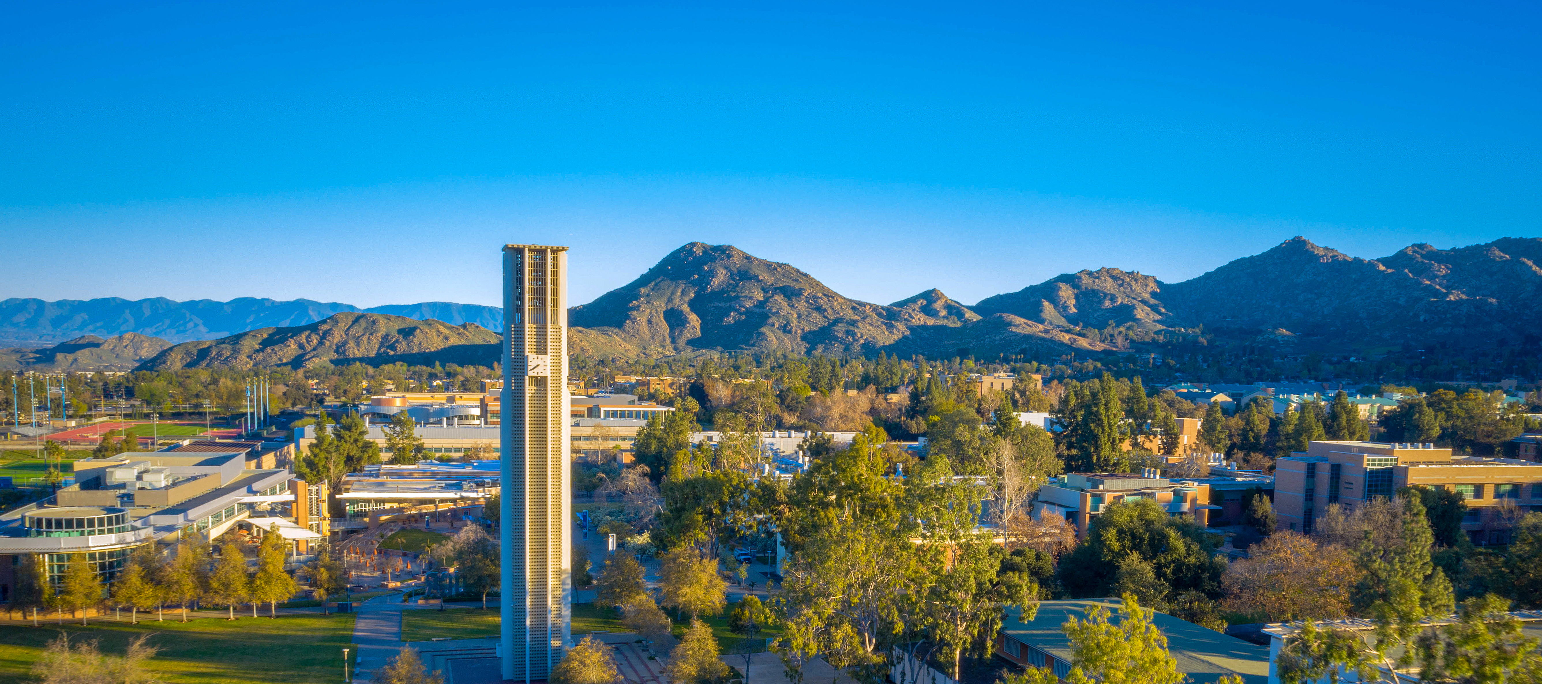 An aerial view of the UCR campus with the bell tower at the center